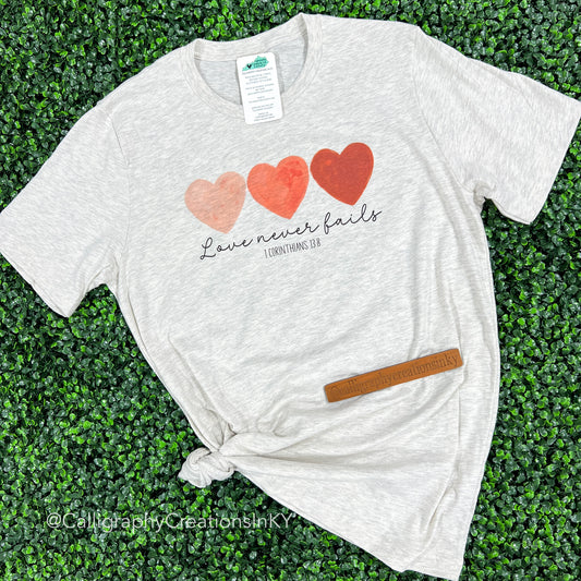 Love Never Fails Tee